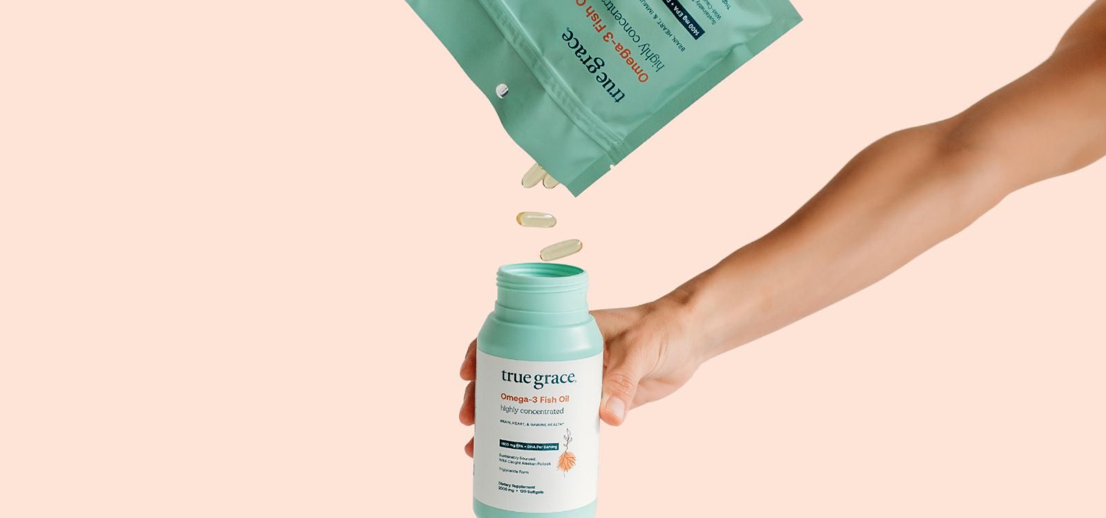 True Grace Omega-3 Fish Oil bottles with refill pouch. Fish Oil capsules pouring into bottle highlighting sustainability.