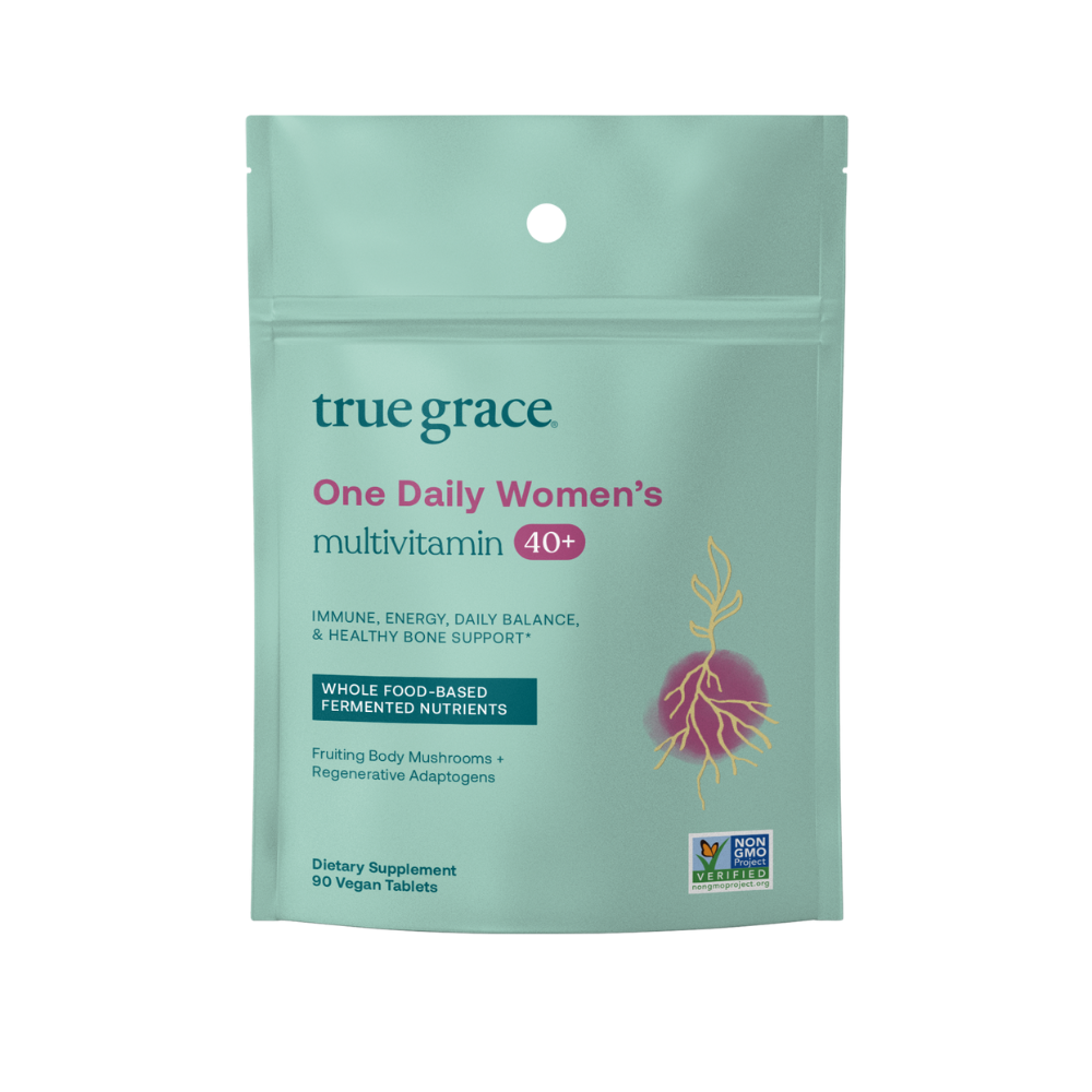 True Grace One Daily Women's Multivitamin 40+ product pouch with 90 vegan tablets on white background. Multivitamin for Immune Support, Energy, Daily Balance, and Healthy Bone Support.