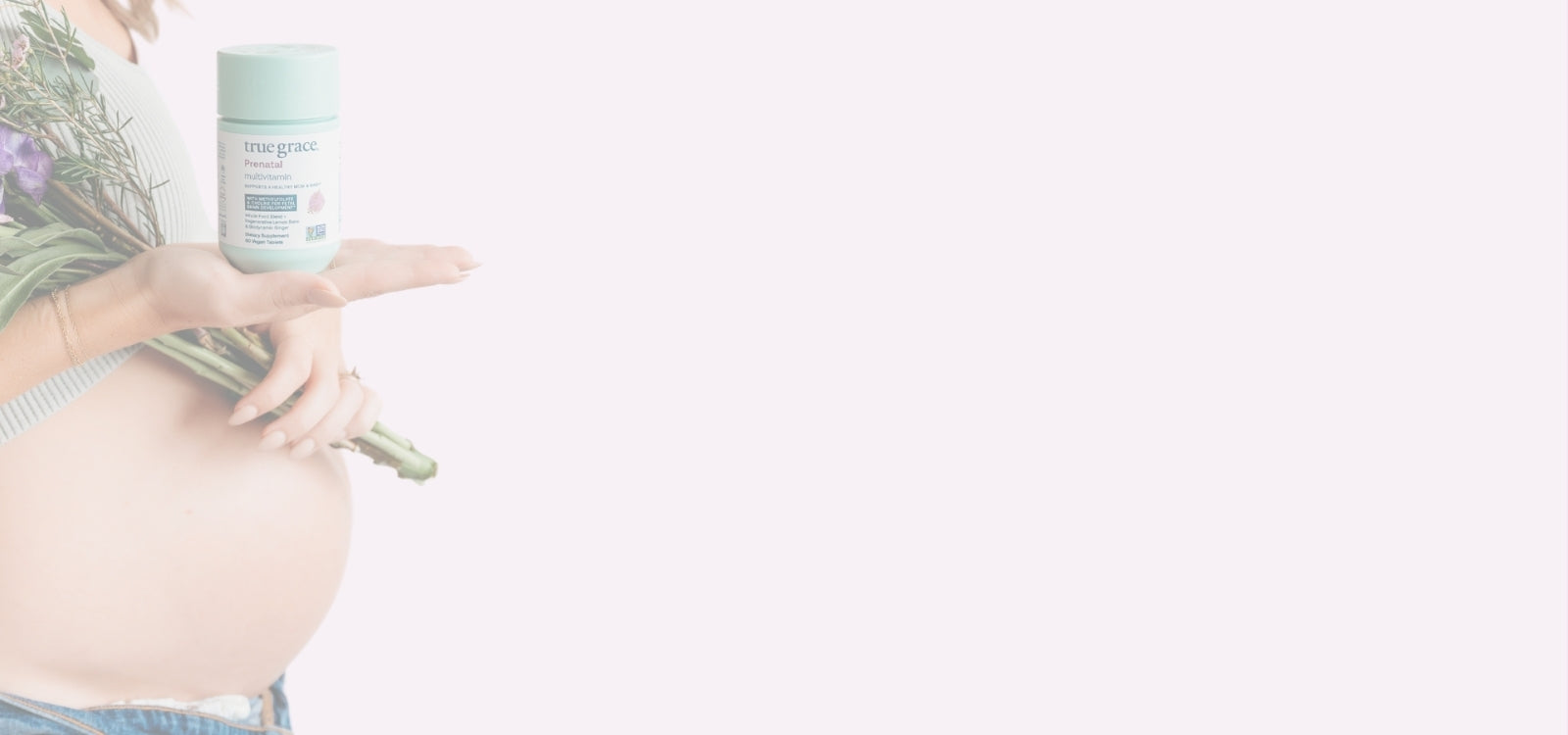 Pregnant woman holding a bottle True Grace Prenatal vitamins