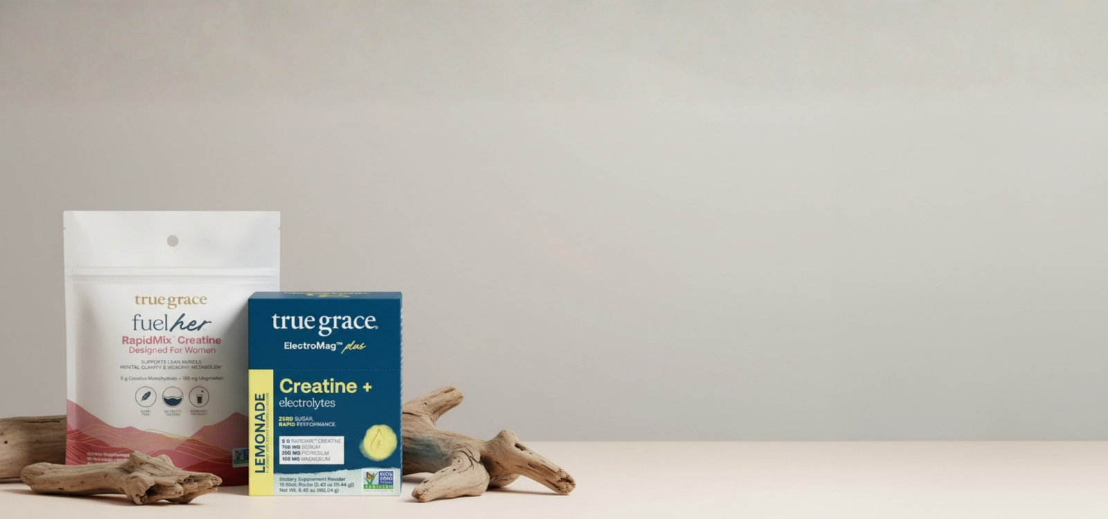 True Grace FuelHer and ElectroMag Plus supplements side by side, two science-backed products designed to support women's metabolic health and performance.
