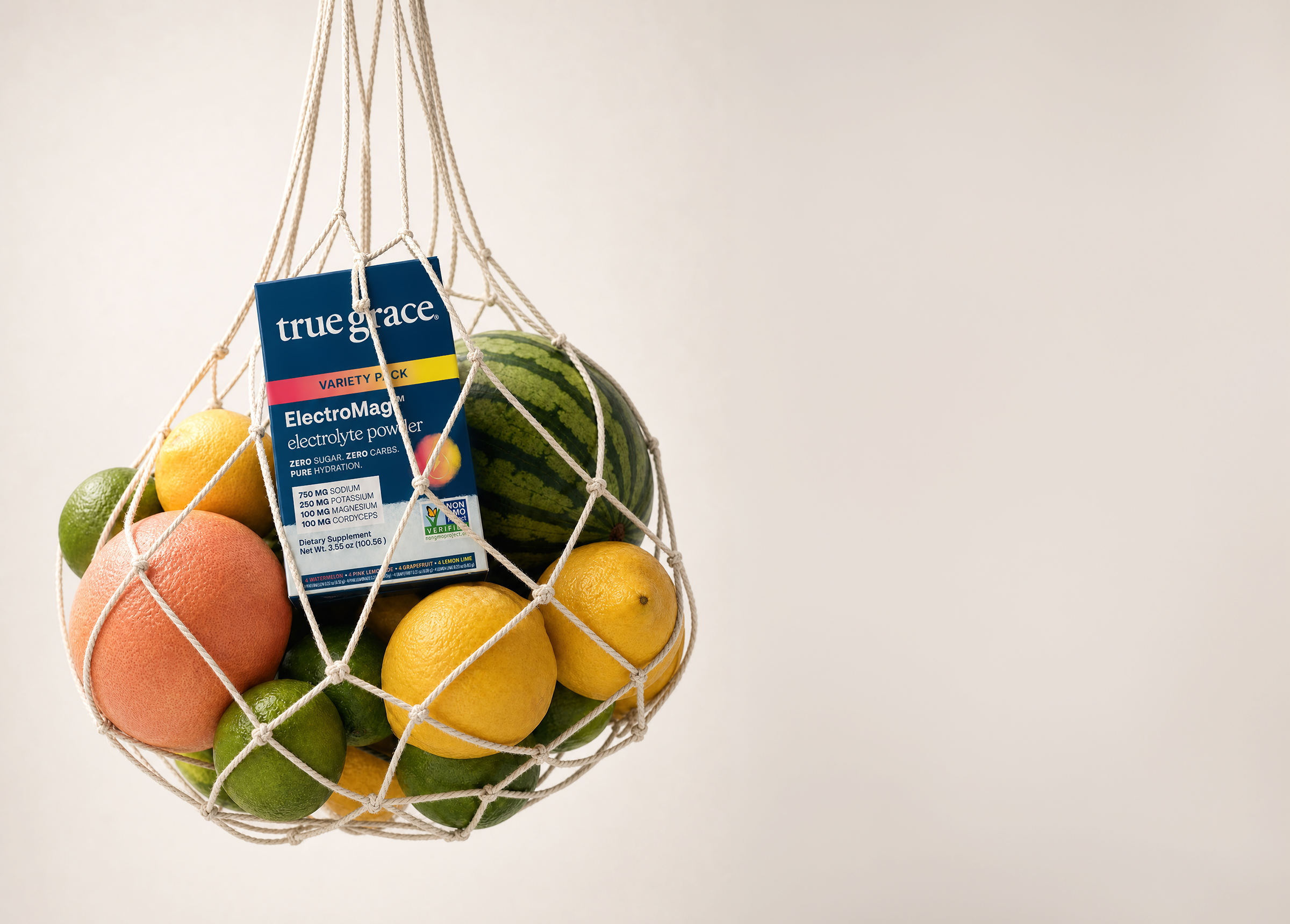 Fruit bag with a 'true grace' product inside on a plain background