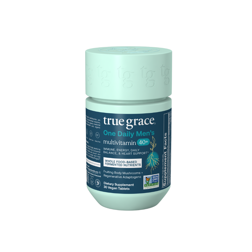 A bottle of 'True Grace One Daily Men's Multivitamin 40+' with details on the whole food-based fermented nutrients